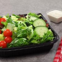 Garden Salad · A delightful mix of romaine, iceberg, and tender spring mix lettuces topped with cherry toma...