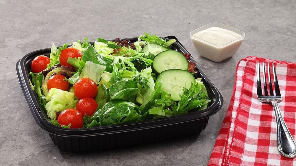 Garden Salad · A delightful mix of romaine, iceberg and tender spring mix lettuces topped with cherry tomatoes, cucumbers, and croutons plus your choice of dressing.