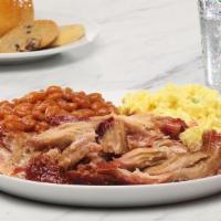 Smoked Pulled Pork · Pork shoulder seasoned and slow-smoked on-site with hickory wood for tender pull-apart goodn...