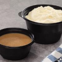 Mashed Potatoes & Gravy · Creamy Mashed Potatoes with a side of brown gravy. Mashed Potatoes served in a 24. oz. bowl.