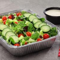 Garden Salad · A delightful mix of romaine, iceberg, and tender spring mix lettuces topped with cherry toma...