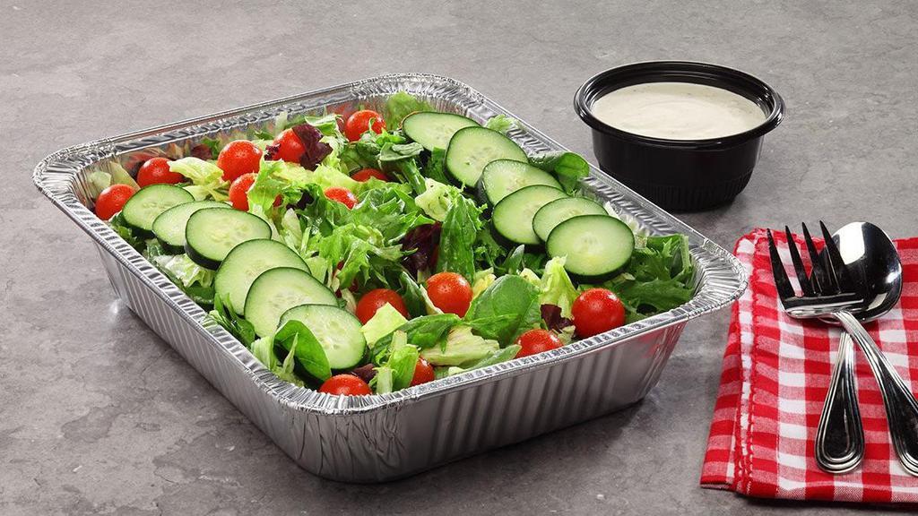 Garden Salad · A delightful mix of romaine, iceberg, and tender spring mix lettuces topped with cherry tomatoes, cucumbers, and croutons plus your choice of dressing.