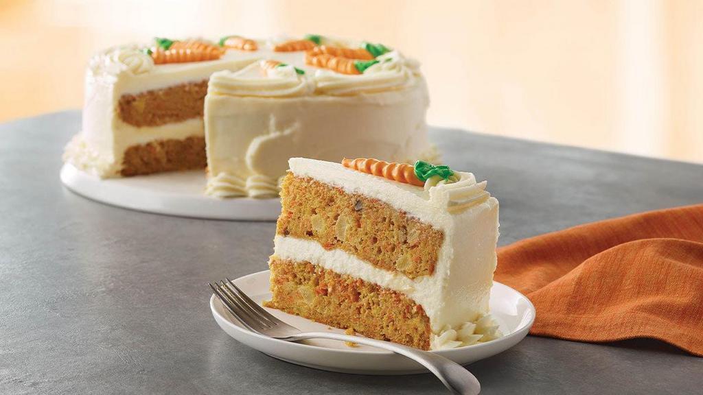 Carrot Cake · Our famous Carrot Cake topped with cream cheese icing. Available whole, half, or by the slice.