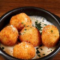 Croquette · POTATO CROQUETTE WITH GRUYERE CHEESE, PARMESAN CHEESE , LEEKS, PARSLEY,SERVED WITH TRUFFLE F...