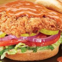 Nashville Hot · buttermilk brined fried chicken • lettuce blend • tomatoes • red onions • pickles • mayo • n...