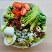 Cobb Salad · Hardboiled egg, bacon, avocado, tomato, and blue cheese.