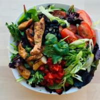 Fajitas Salad · Tomato, bell peppers, green onions, cilantro, and black beans.