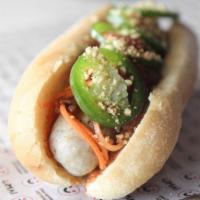 Saigon Hustle · Bratwurst, cilantro, roasted peanuts, sweet chili, pickled daikon and carrots, teriyaki hois...