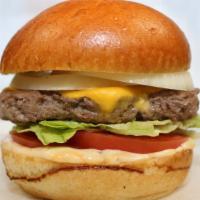 IMPOSSIBLE The Merican · Eat the IMPOSSIBLE with the 100% plant based IMPOSSIBLE Burger. Topped with umami glaze, Ame...