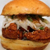 Cluckbanger · Chicken sandwich infused with awesome Korean flavors! Sweet and tangy with a mild kick, topp...