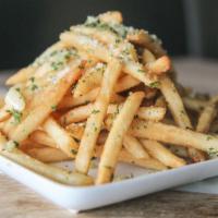 Garlic Fries · Crispy fries loaded with garlic, garlic, garlic, oh and parmesan cheese!
