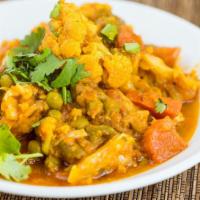 Mix Vegetable Curry · Seasoned vegetables in light curry sauce.