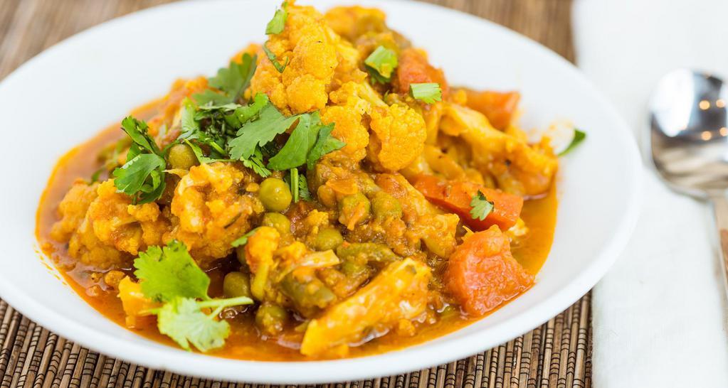 Mix Vegetable Curry · Seasoned vegetables in light curry sauce.