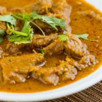 Bhuna Gosht · Lamb curry cooked with onions and tomatoes.