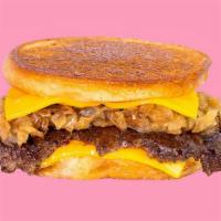 Karl'S Deluxe · A patty melt served Karl’s Style with a crispy seasoned beef patty, caramelized onion and ch...