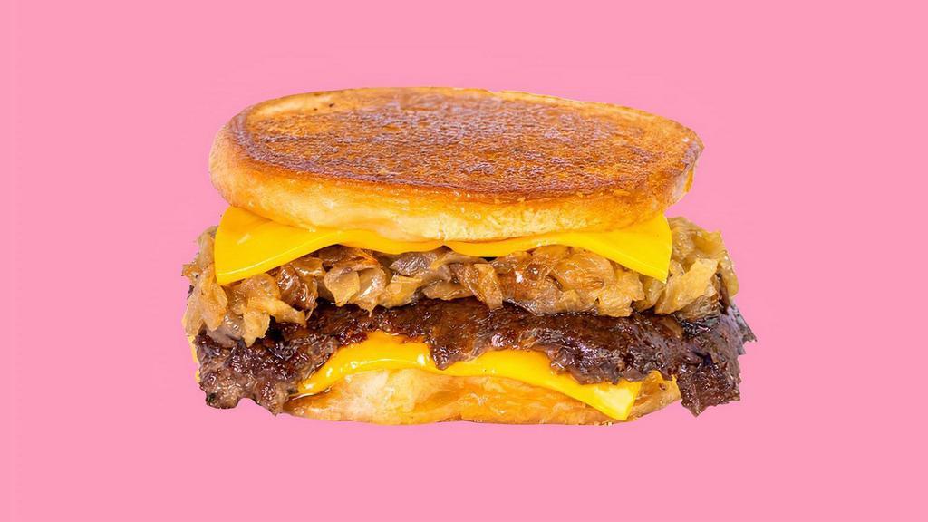 Karl'S Deluxe · A patty melt served Karl’s Style with a crispy seasoned beef patty, caramelized onion and cheese in a toasty inverted bun.