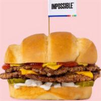 Impossible™ Beast Style · Smashed crispy Impossible™ patty with house seasoning, American cheese, pickles, diced white...