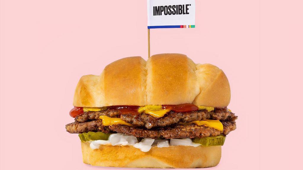 Impossible™ Beast Style · Smashed crispy Impossible™ patty with house seasoning, American cheese, pickles, diced white onion, mayo, ketchup, and brown mustard on a soft roll