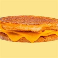 Karl’S Grilled Cheese Sandwich · 3 slices of American cheese griddled crisp on an inverted bun.