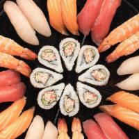 Tsukiji Platter · A combination platter with: California Roll†, Tuna Nigiri*, Yellowtail Nigiri*, Salmon Nigir...