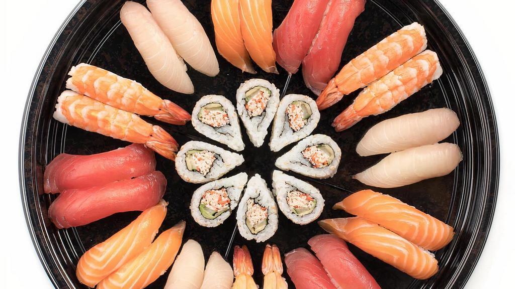 Tsukiji Platter · A combination platter with: California Roll†, Tuna Nigiri*, Yellowtail Nigiri*, Salmon Nigiri*, and Shrimp Nigiri