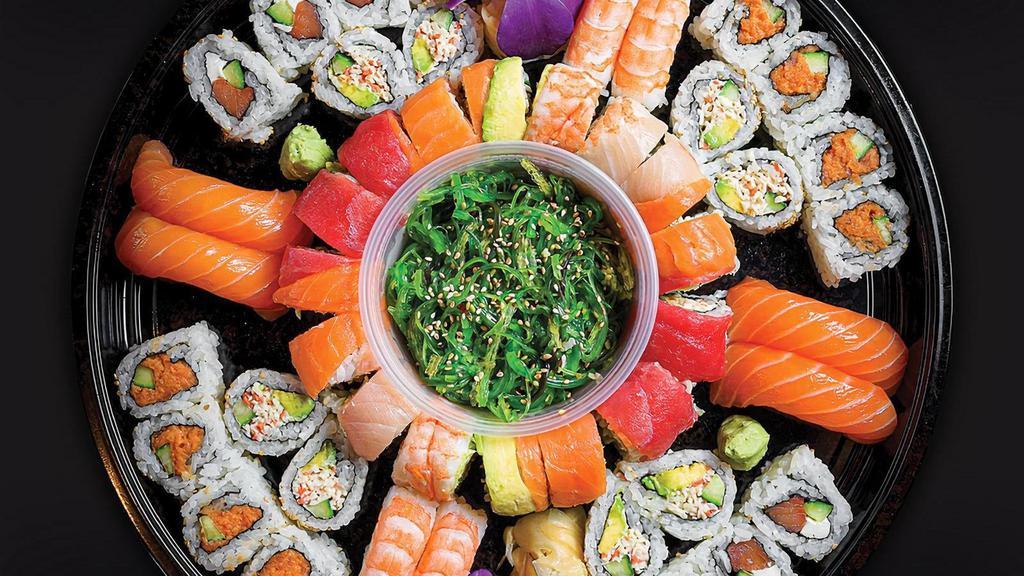 Sushi O'Clock Platter† · Comes with: . - Seaweed Salad . - Shrimp Nigiri . - Salmon Nigiri. - California Roll. - Philadelphia Roll. - Spicy Tuna Roll. - Rainbow Roll .