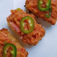 Crispy Spicy Rice · Crispy spicy rice with your choice of Salmon, Yellowtail or Tuna, served on top of crispy se...