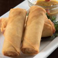 Spring Rolls  · Lightly fried vegetable spring rolls served with spicy sesame mustard dipping sauce.