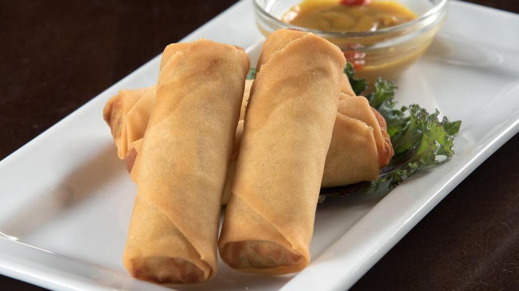 Spring Rolls · Lightly fried vegetable spring rolls served with spicy sesame mustard dipping sauce