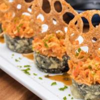 *Viva Las Vegas Roll · Krab† and cream cheese rolled in rice and seaweed, lightly tempura battered and topped with ...