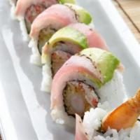Ultimate Shrimp Tempura Roll* · Shrimp tempura with spicy krab† mix and cucumber, rolled and topped with seared tuna and avo...