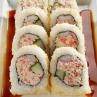 Tootsy Maki Roll · Krab† mix, shrimp and cucumber rolled and topped with crunchy tempura bits; drizzled with sw...
