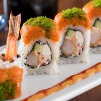 Gojira Roll* · Shrimp tempura, krab† mix, cream cheese and cucumber rolled and topped with spicy tuna and g...