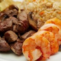 Hibachi Filet Mignon & Colossal Shrimp · Served with hibachi vegetables, “RA”ckin’ Fried Rice and homemade dipping sauces.