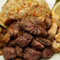Filet Mignon & Chicken · Served with hibachi vegetables, “RA”ckin’ Fried Rice and homemade dipping sauces.