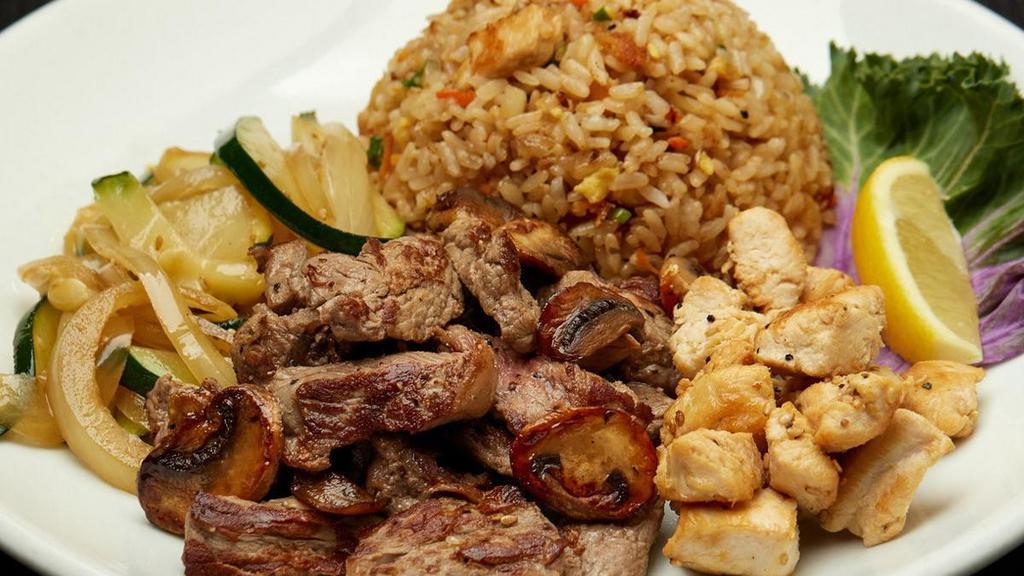 Hibachi Steak & Chicken · Served with hibachi vegetables, “RA”ckin’ Fried Rice and homemade dipping sauces.