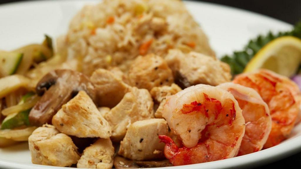 Hibachi Chicken & Colossal Shrimp · Served with hibachi vegetables, “RA”ckin’ Fried Rice and homemade dipping sauces.