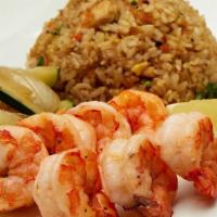 Colossal Shrimp · Colossal shrimp served with sauteed zucchini, mushrooms, and onions,“RA”ckin’ Fried Rice and...