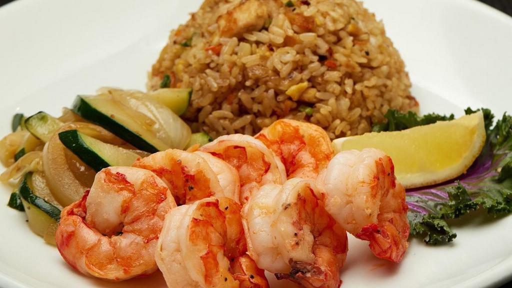 Hibachi Colossal Shrimp · Served with hibachi vegetables, “RA”ckin’ Fried Rice and homemade dipping sauces.