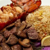 Fliet Mignon & Lobster · Filet mignon* and cold water lobster tail grilled with lemon. Served with hibachi vegetables...