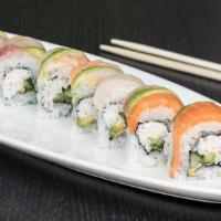 Rainbow Roll* · The classic California Roll† topped with tuna, yellowtail, shrimp, salmon and avocado to loo...