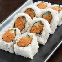 Spicy Tuna Roll* · Fresh tuna mixed with spicy mayo sauce, combined with cucumber and rolled in seaweed and ric...