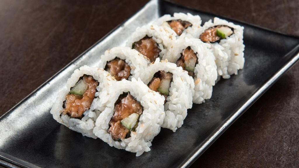 Spicy Salmon Roll* · Salmon mixed with spicy mayo combined with cucumber, rolled in seaweed and rice