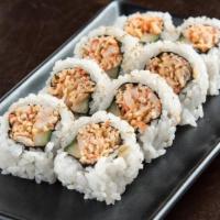 Spicy Shrimp Roll · Shrimp and krab† mix combined with spicy mayo and cucumber, rolled in seaweed and rice, and ...