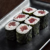 Tuna Roll · Fresh tuna and rice rolled in seaweed