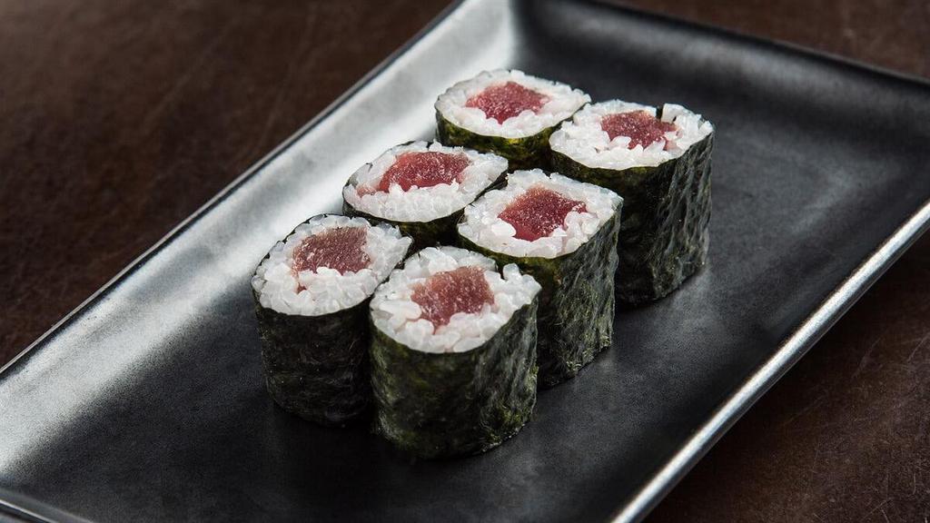 TUNA ROLL · Fresh tuna and rice rolled in seaweed