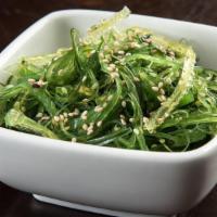 Seaweed Salad · Traditional seaweed salad with vinegar, soy sauce, sesame oil, ginger and garlic; topped wit...