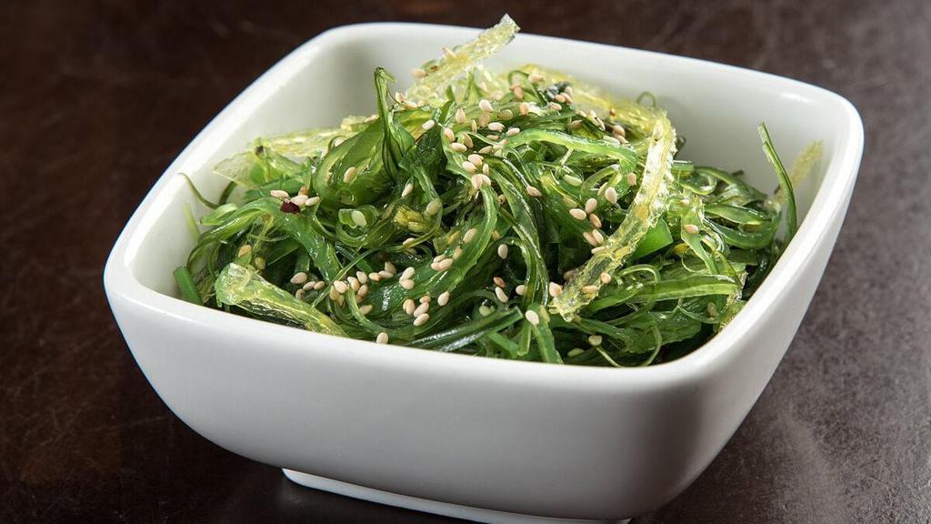 Seaweed Salad · Traditional seaweed salad with vinegar, soy sauce, sesame oil, ginger and garlic; topped with sesame seeds.