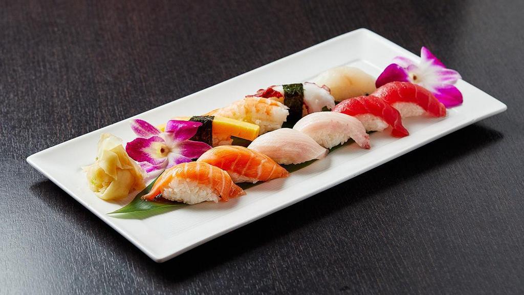 Nigiri Assortment · Two pieces of each: tuna, yellowtail and salmon; served with one piece each: whitefish, shrimp, octopus, and tamago.
