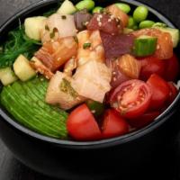 Bara Chirashi Bowl* · Ahi tuna, salmon, yellowtail, shrimp, cucumber and green onions mixed with poke sauce; serve...